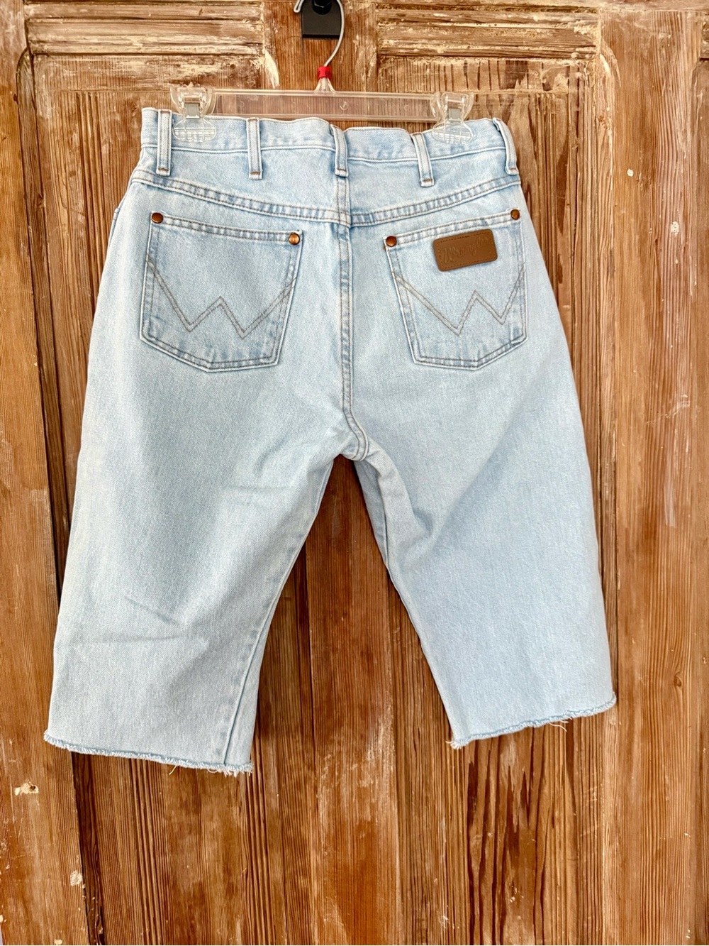 Wrangler light blue denim cut off shorts.